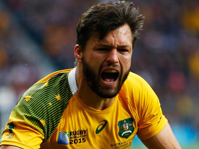 LONDON, ENGLAND - OCTOBER 18: Adam Ashley-Cooper of Australia celebrates scoring his teams opening try during the 2015 Rugby World Cup Quarter Final match between Australia and Scotland at Twickenham Stadium on October 18, 2015 in London, United Kingdom. (Photo by Mike Hewitt/Getty Images)