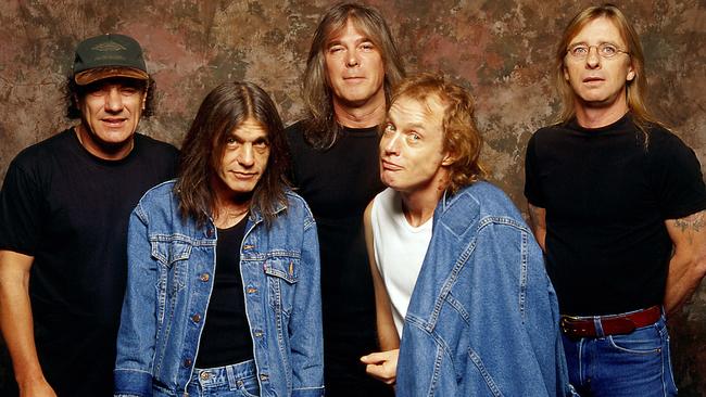 Phil Rudd (right) with other members of AC/DC (from left) lead singer Brian Johnson, Malcolm Young, Cliff Williams and Angus Young.