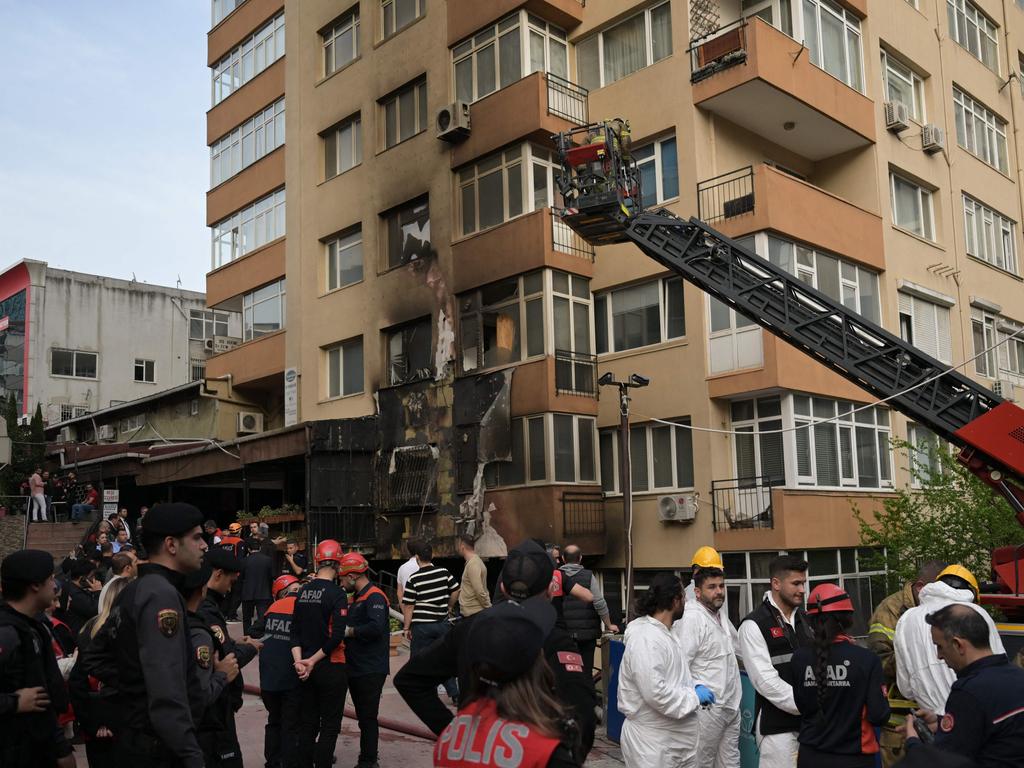 Emergency personnel intervene at the site of a fire in a residential building in Istanbul. Picture: AFP