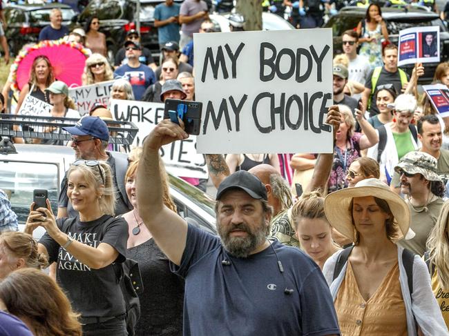 MELBOURNE, AUSTRALIA - NewsWire Photos FEBRUARY 20, 2021: Protestors march at an Anti Vaccination protest in St Kilda Rd on Saturday afternoonPicture: NCA NewsWire / David Geraghty