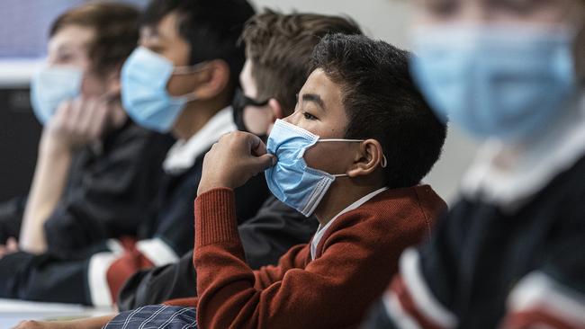 Experts say face masks may help when school returns. Picture: Getty Images