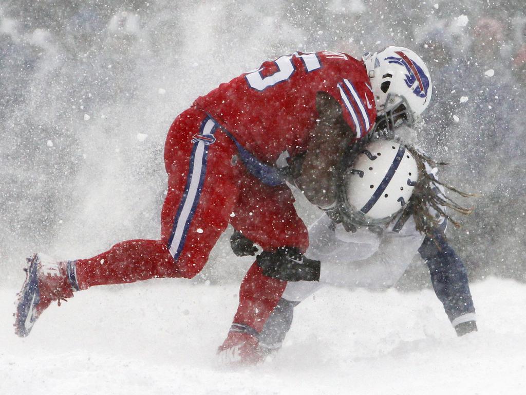 Buffalo Bills defensive tackle Tim Settle (99) applies pressure during an  NFL wild-card football game Sunday, Jan. 15, 2023, in Orchard Park, NY. (AP  Photo/Matt Durisko Stock Photo - Alamy