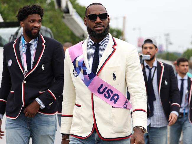 LeBron James in a white Ralph Lauren blazer was the epitome of icon meeting icon. Picture: Getty Images