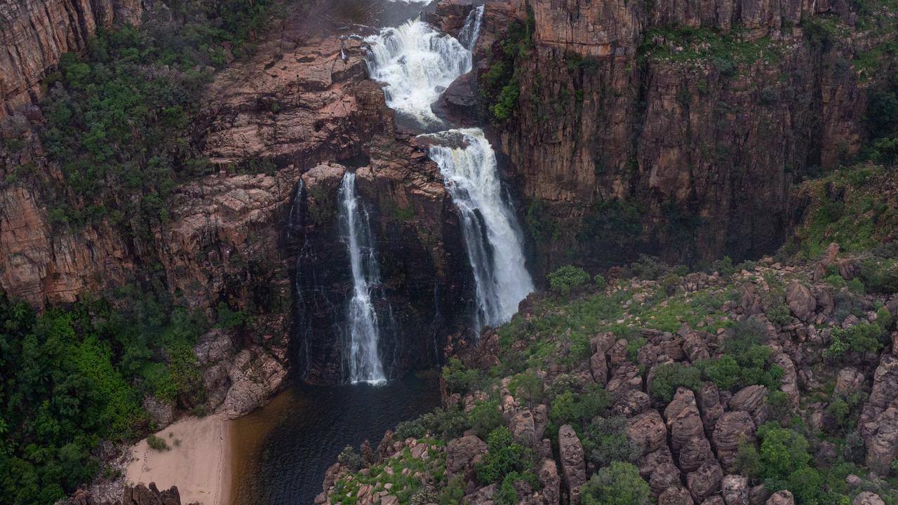 Kakadu National Park comes alive during the wet season. Kakadu Air are celebrating their 40th anniversary of flying in the Territory and relish the opportunity to show the NT News a new perspective of the park after rainfall. Twin Falls is shrouded in cloud in the morning light. Picture: Che Chorley