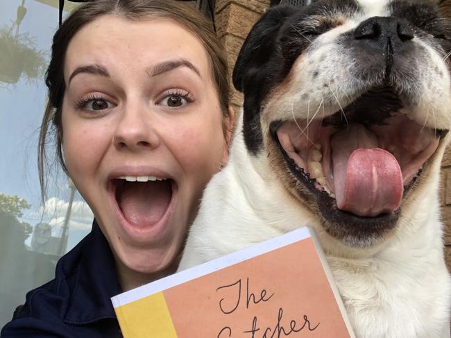 Antonia Lijic studies The Catcher in the Rye with the help of her puggle Luna