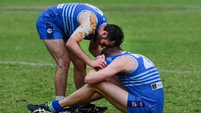 SHOC’s Taylor Angel consoles Connor Hartshorne their grand final lost last season. Picture: Brenton Edwards