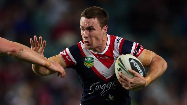 Maloney won a premiership in his first season with the Roosters.