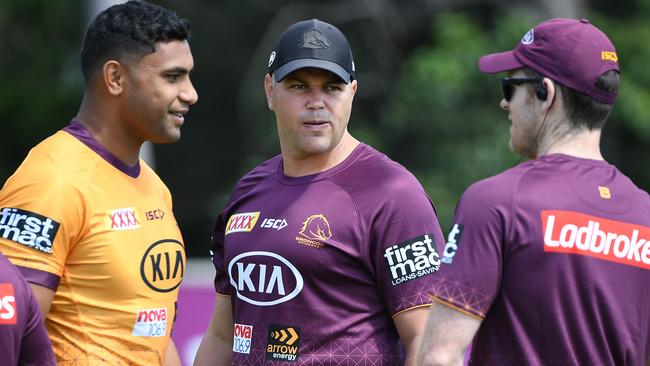 Brisbane Broncos coach Anthony Seibold (centre) and player Tevita pang Jr (left) at Broncos training this week. Picture: AAP