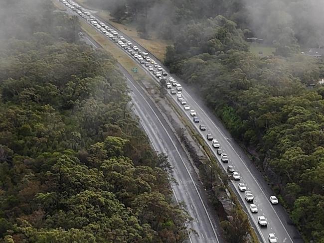 Last Friday’s chaos on the M1 after a truck lost its load of scrap metal, and cars had their tyres shredded by the spill. Picture: TNV
