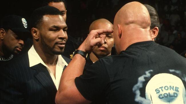 Mike Tyson and Stone Cold Steve Austin square off in January, 1998. Picture: WWE