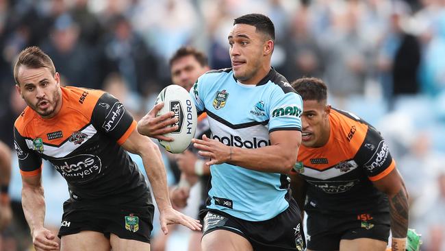 Valentine Holmes sprints away to score a try from a pass. Picture: Brett Costello