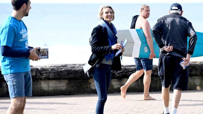 Liberal Candidate for the seat of Warringah, Katherine Deves, hands out campaign leaflets at Manly Beach. Picture: NCA NewsWire/Jeremy Piper