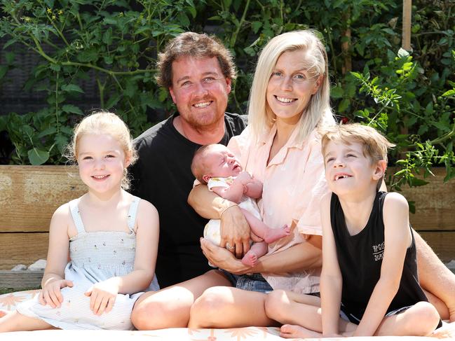 Paul Cromarty and Tegan Porteous with kids Isaac, 7, and Lara, 4, and baby Brody who was delivered by dad while on the phone to triple-0. Picture: Tim Hunter