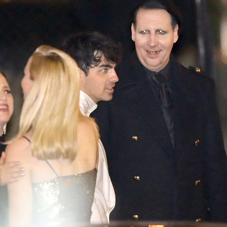 Why was he there? Hard rocking Manson is now seen hanging out with Joe Jonas and Sophie Turner. Picture: BackGrid 