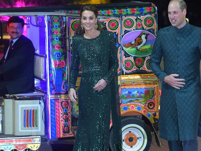 The Duke and Duchess of Cambridge, pictured arriving on a decorated autorickshaw to attend a reception in Islamabad, are the shining stars of the royal family. Picture: AFP