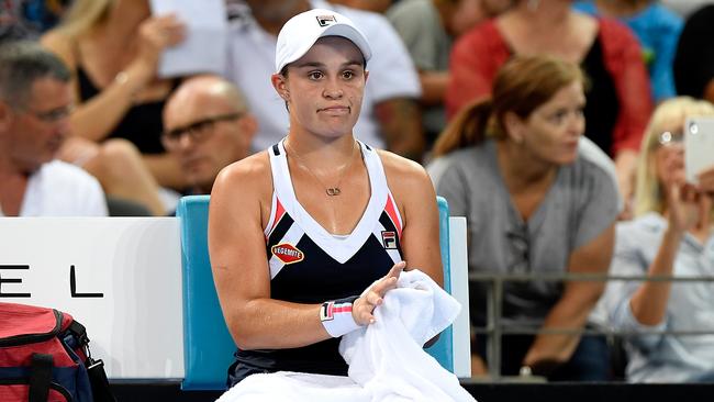 Ash Barty dejected after losing to Lesia Tsurenko.