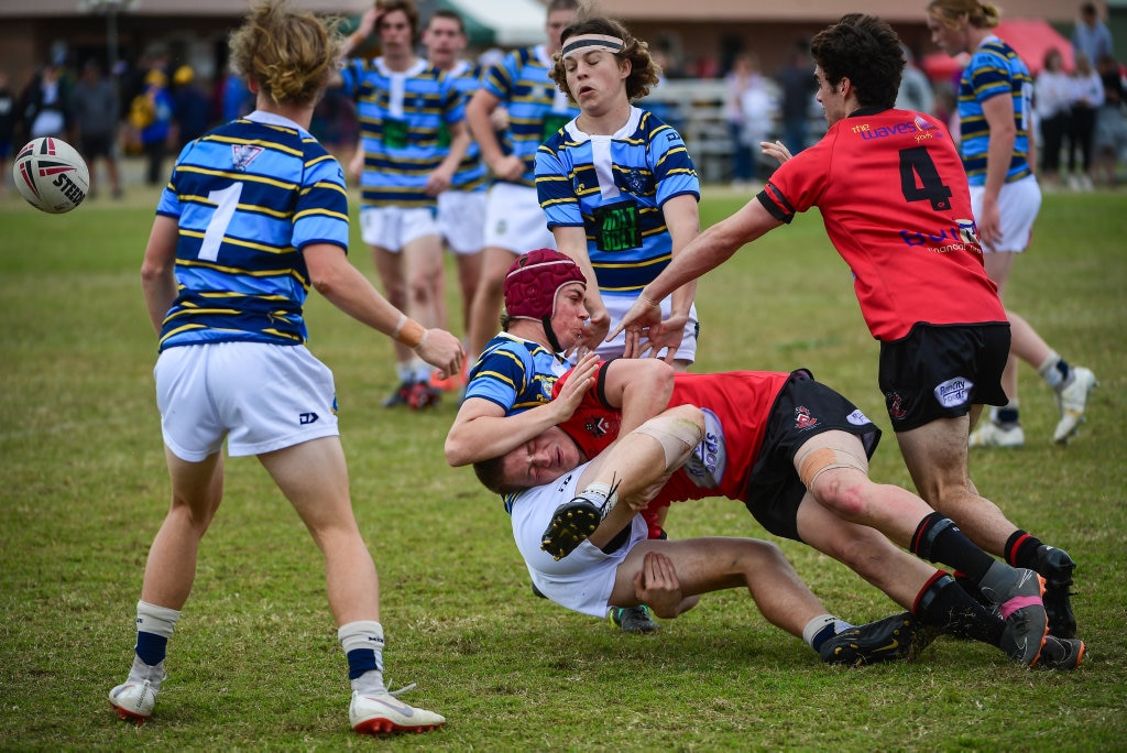 Luke Hollinger - St Columban's College, Caboolture gets tackled by Jobe Lister Shalom College, Bundaberg