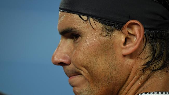 Spain's Rafael Nadal grimaces between points. Picture: Greg Wood/AFP