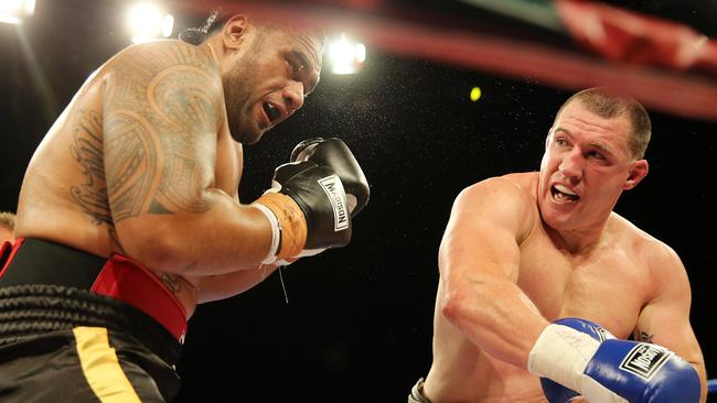 Cronulla captain Paul Gallen (right) in action against Canberra’s Junior Paulo on Friday night.