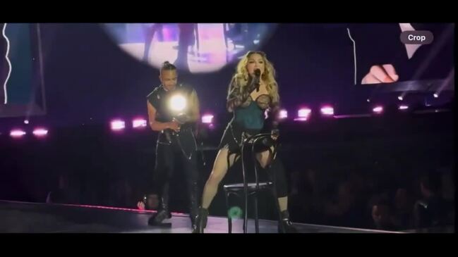 Madonna falls backwards in her chair during Seattle concert