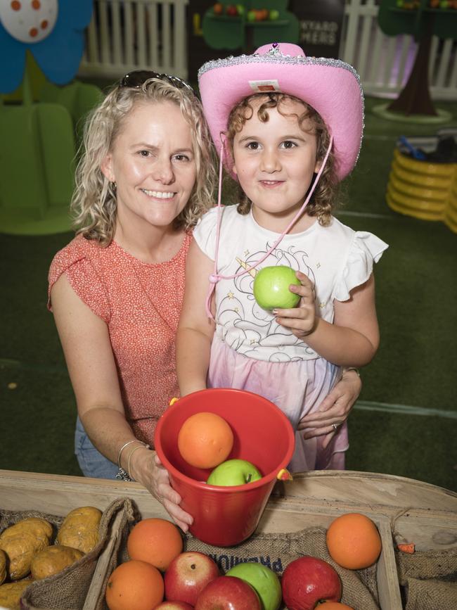 Kristy Majetic and daughter Ava Majetic play in the Little Backyard Farmers area at the Toowoomba Royal Show, Saturday, April 1, 2023. Picture: Kevin Farmer