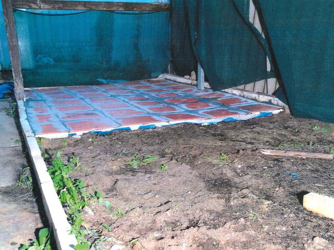 Murder plot covered with tiles in the back yard where Jemma Lilley and Trudi Lennon buried Aaron Pajich. Picture: WA Police.