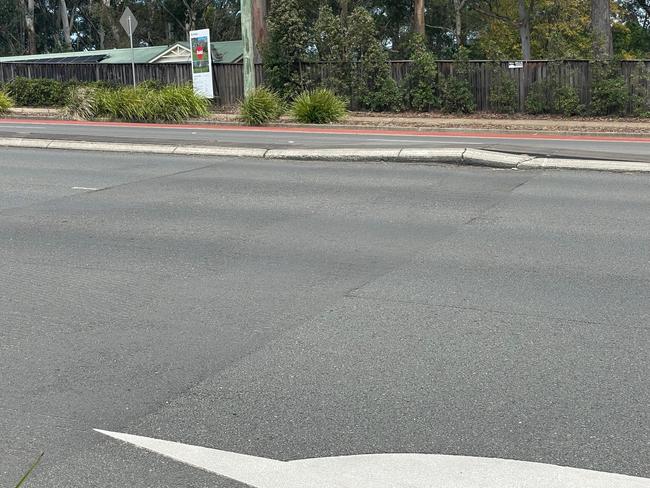 A section near the Richies IGA has been repaired a number of times but bumps are staring to form again. The concrete median shows how high previous bumps have formed. Picture: Richard Noone