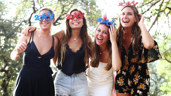 Revellers at Mrs Macquarie's Point ahead of the 2017 New Year's Eve Fireworks in Sydney. Picture: Hollie Adams.