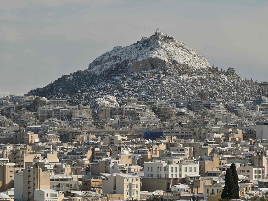 The snow-covered Lycabettus Hill in Athens. Picture: Louisa Gouliamaki/AFP