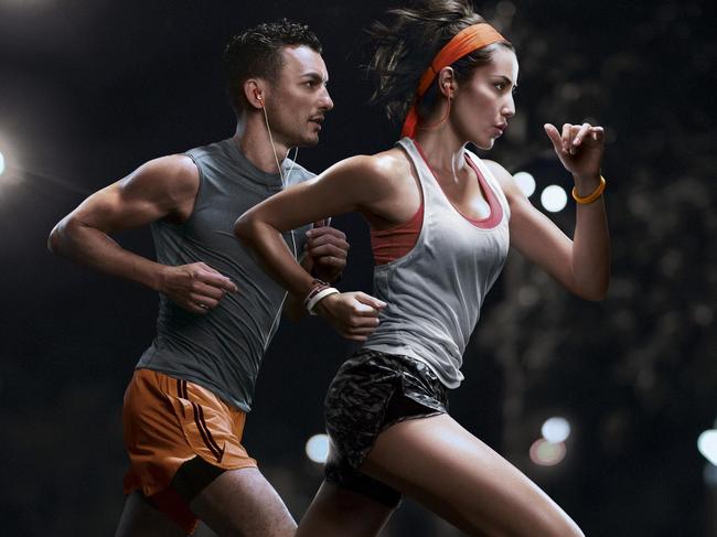 Philips ActionFit Airborn earbuds, in orange, connect to smartphones to deliver music.