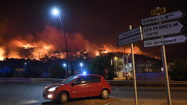 A fire blazes at Les Pennes-Mirabeau, near Marseilles, southern France on August 11. Picture: AFP