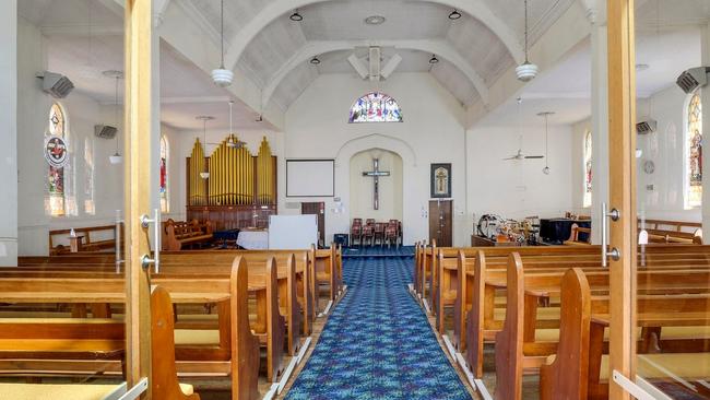 The furniture, from the pews to the organ, is included with one of the churches.