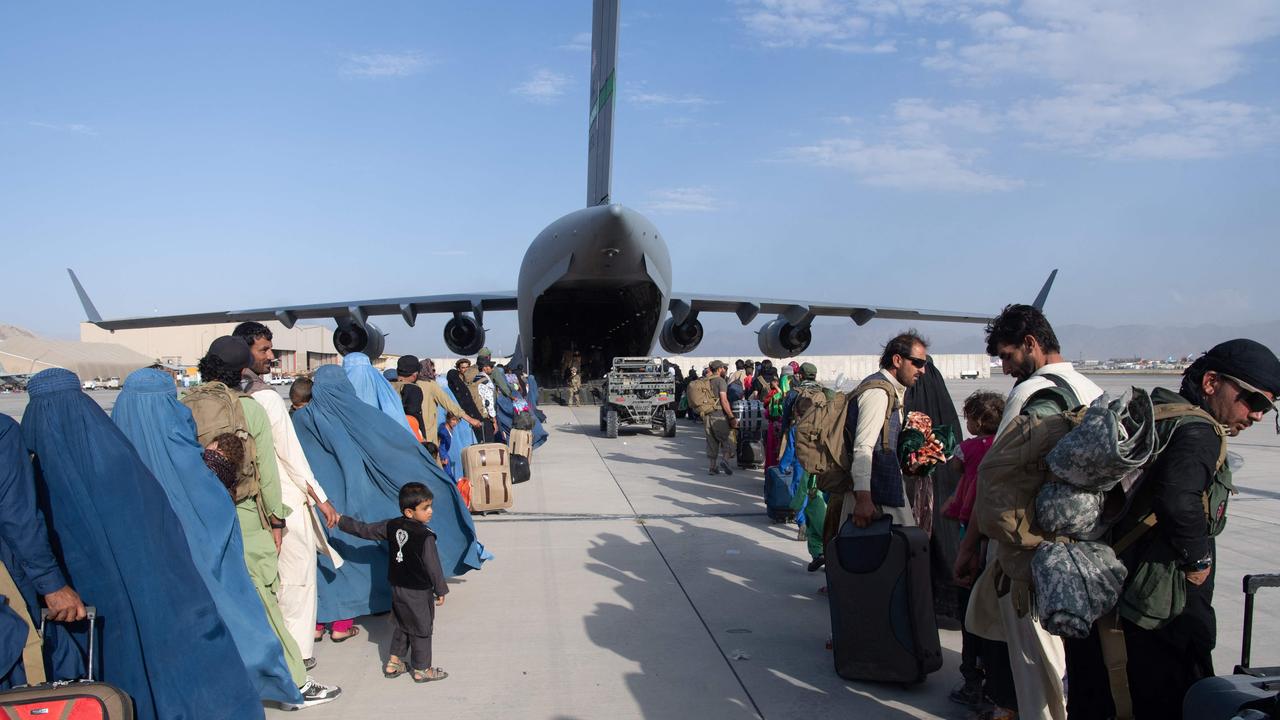 US air force loadmasters and pilots at Hamid Karzai International Airport. Picture: Donald R Allen/US Air Force/AFP