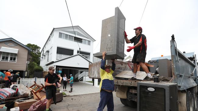 Cleaning up in Vincent St, Auchenflower. Picture: Annette Dew