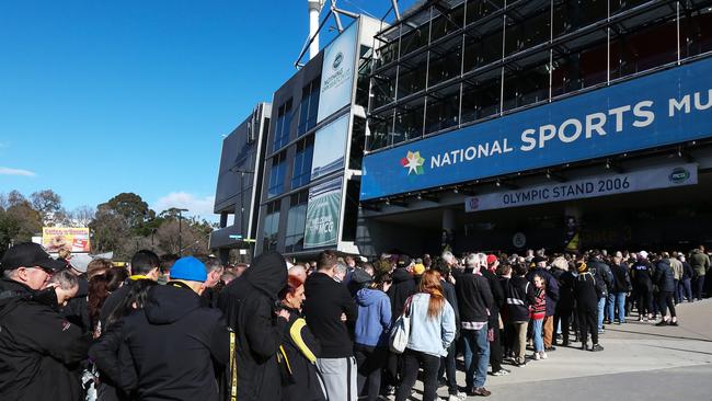 Fans queue up before the start of a match. Picture: Ian Currie