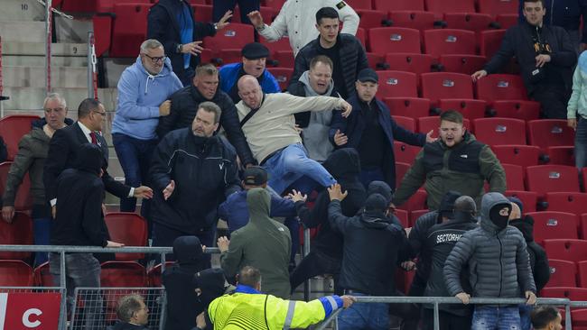 ALKMAAR, NETHERLANDS - MAY 18: Supporters fighting after the match looks on after the UEFA Europa Conference League semi-final second leg match between AZ Alkmaar and West Ham United at AFAS Stadion on May 18, 2023 in Alkmaar, Netherlands. (Photo by NESimages/Geert van Erven/DeFodi Images via Getty Images)