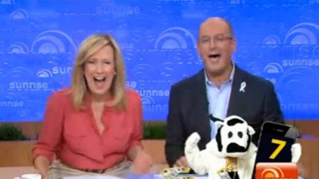 … and laughing it up on screen on Sunrise — reacting to a caller who answered the phone with 'I wake up with (rival Channel 9 show) Today'.