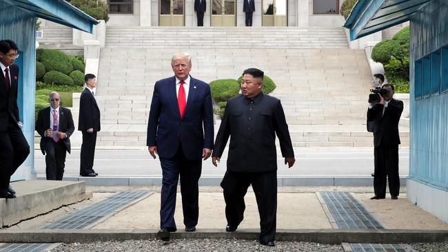 North Korean leader Kim Jong Un and U.S. President Donald Trump inside the demilitarised zone (DMZ) separating the South and North Korea on June 30, 2019 . Picture: Getty