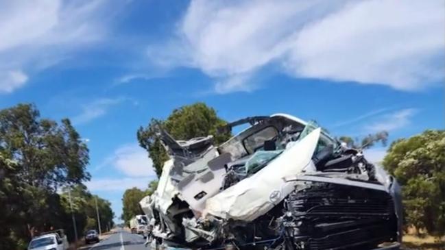 A woman has been flown to hospital with serious injuries and two others have been freed from their vehicle in a shocking crash in Perth’s southeast. A truck and people-mover (pictured) collided on Thomas Rd about 11am on Monday. Pictures from the scene showed just how destructive the incident was, with a truck on its side and boxes of fruit strewn across the road. Picture: Nine News