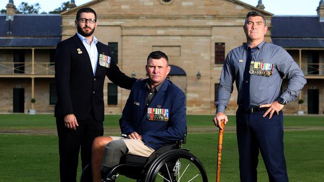 Gary Wilson, Garry Robinson and Peter Rudland — all badly injured in a 2010 Black Hawk crash in Afghanistan — at Victoria Barracks in Sydney. Picture: James Croucher
