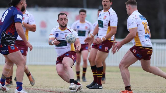 Adam Campbell passes for Thirlmere Roosters. Picture: Steve Montgomery