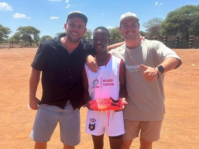 Jarryd Garner and Harry Benson with a South African player. Picture: St Mary's Sporting Club