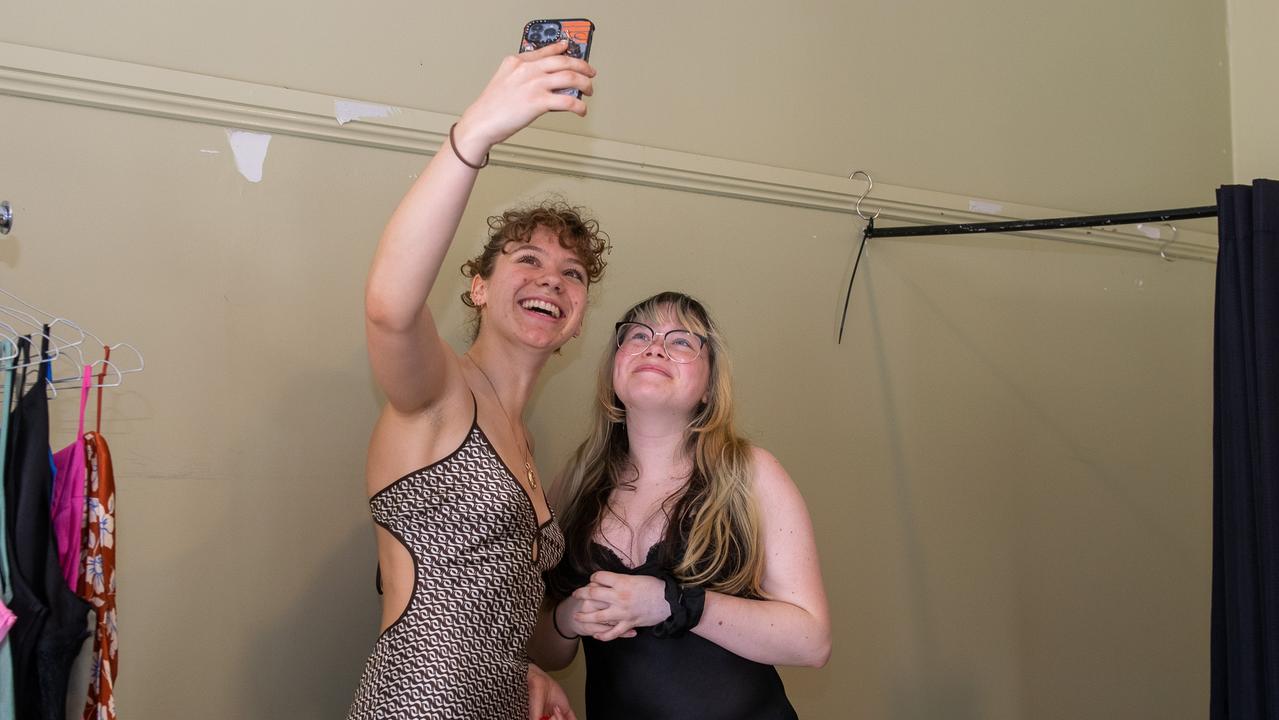 Richmond River Highschool captain Lily Shepherd with peer Bonnie Bennett trying on formal frocks from Bec + Bridge of Sydney, at the Lismore Showgrounds.