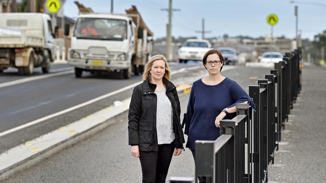 Rebecca Haynes and NKPS P&amp;C chair Alison Nicolson near Helzett Road outside North Kellyville Public School at Kellyville. They are concerned about the state of Helzett Road. PIcture: AAP IMAGE / Troy Snook