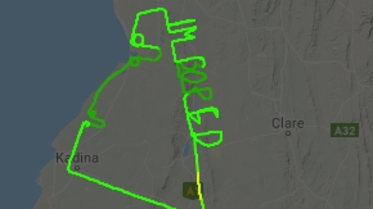 A flight-training Adelaide plane has spelt out bored on its flight path.