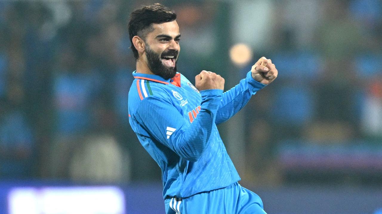 India's Virat Kohli celebrates. Photo by R.Satish BABU / AFP.