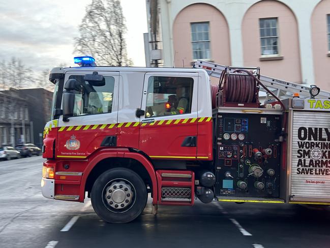 Tasmania Fire Service TFS truck tears through Hobart intersection of Murray Street and Macquarie Street. File image, generic image, fire, Tasmania, The Mercury, emergency services, BEAT Tasmania