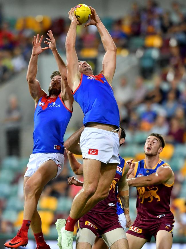 Jesse Hogan marks against Brisbane.