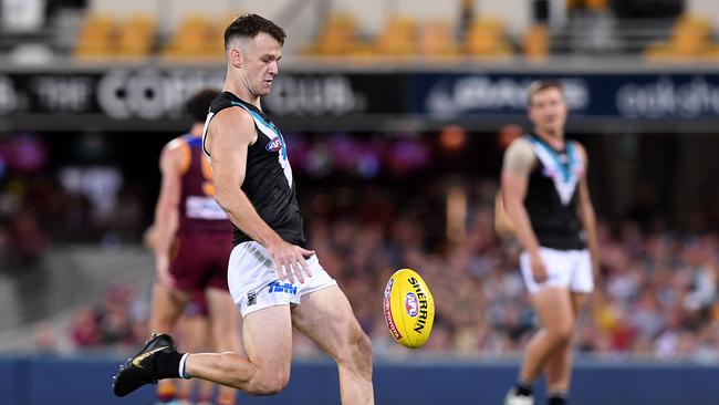 Robbie Gray of the Power kicks a goal against Brisbane. Picture: AAP Image/Dave Hunt