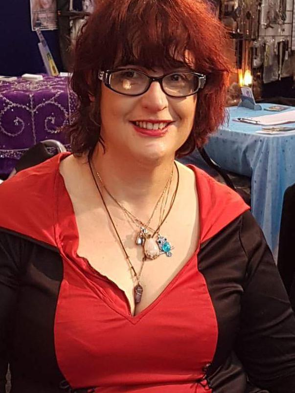 Despite being in a wheelchair, psychic Amie Vello does readings at fairs all around Adelaide. Picture: Supplied